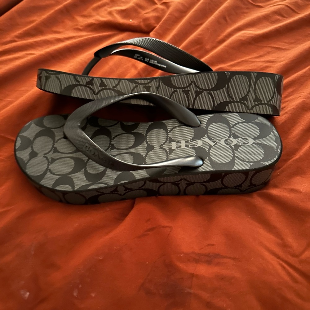 Brand new Coach flip flops size 10